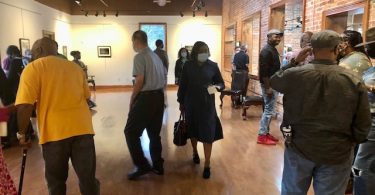 Art lovers browsing at Arts Clayton